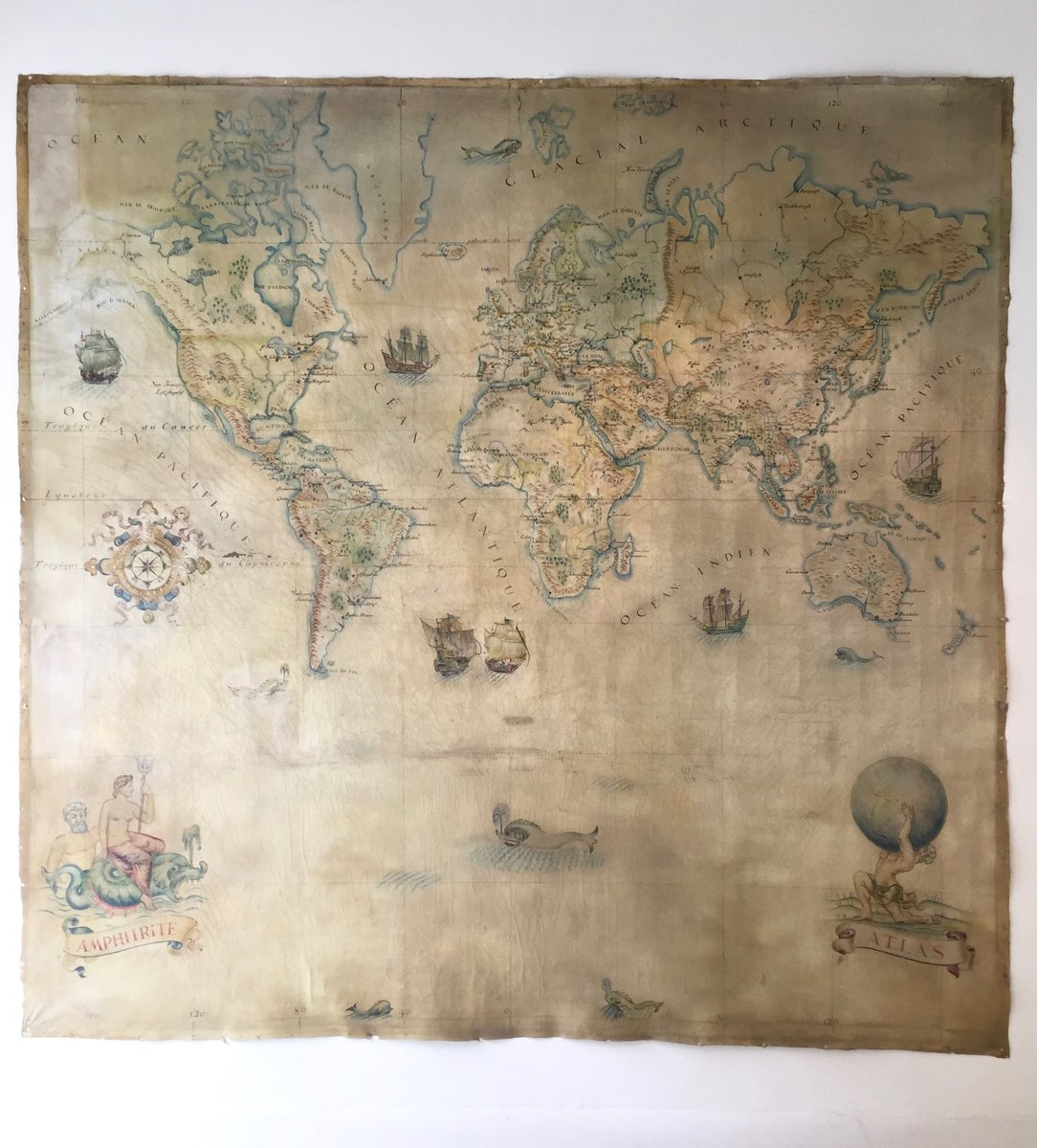large vintage world map in oil on canvas